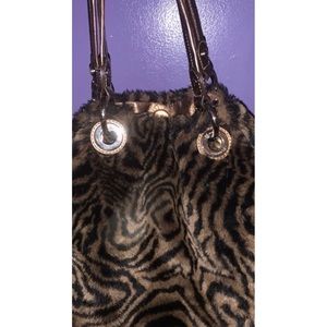 B. Makowsky Cheetah Tote